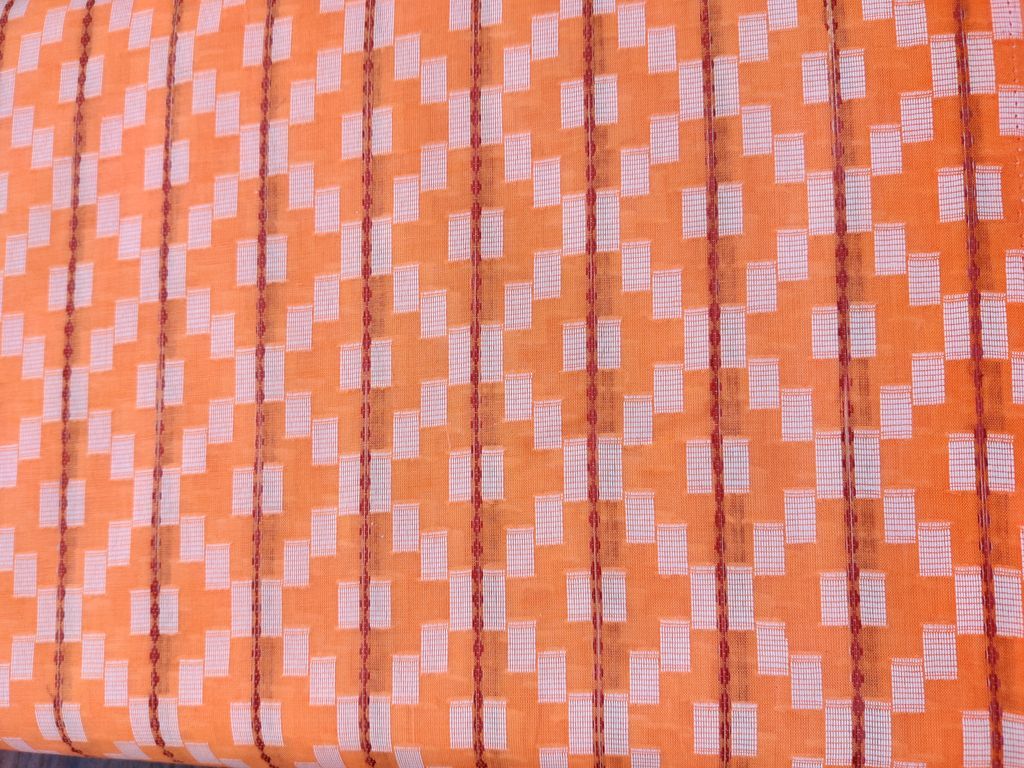 Light Orange Geometric Self Patterned Ikkat Cotton Fabric