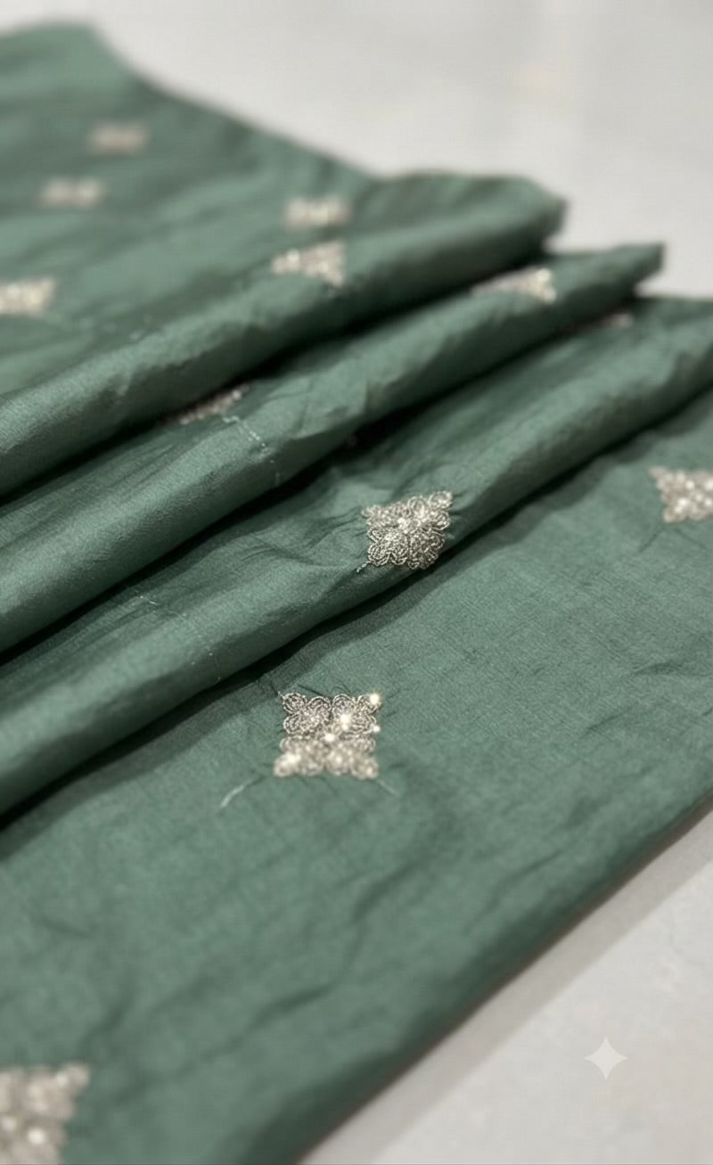 Golden Glitter Thread Embroidered Motifs on Sage Green Malai Chanderi Silk Fabric - folded fabric detail