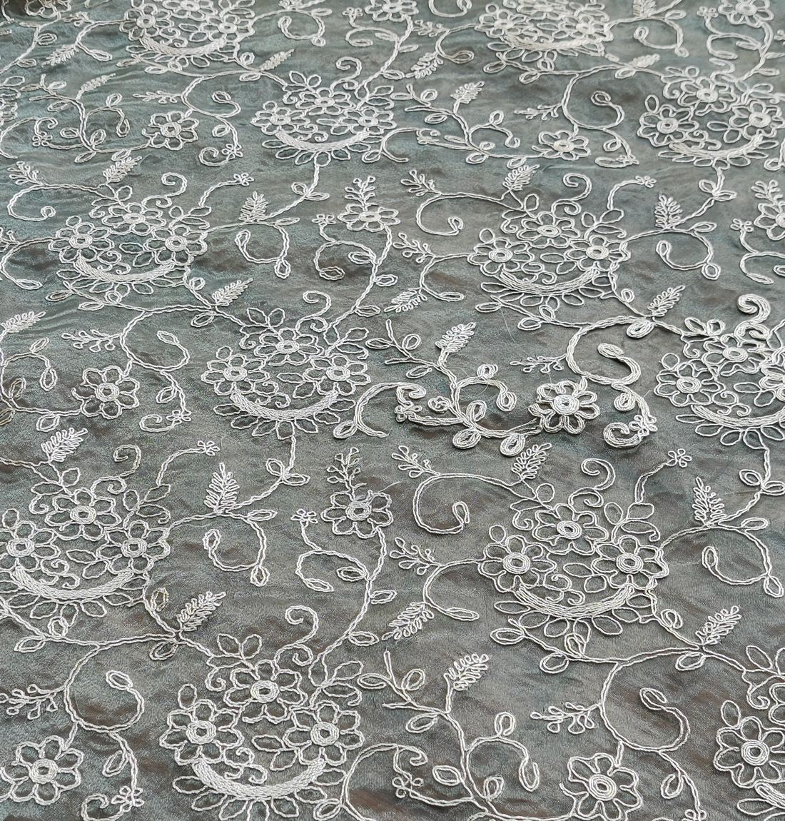 Green Floral Self Embroidered Organza Fabric