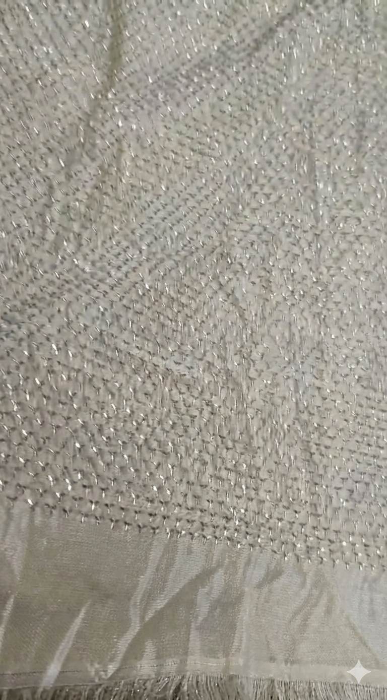 OFF WHITE base heavily infused with a golden undertone.
Metallic Shimmer Dyeble Fabric with Heavy Handwork Jaal