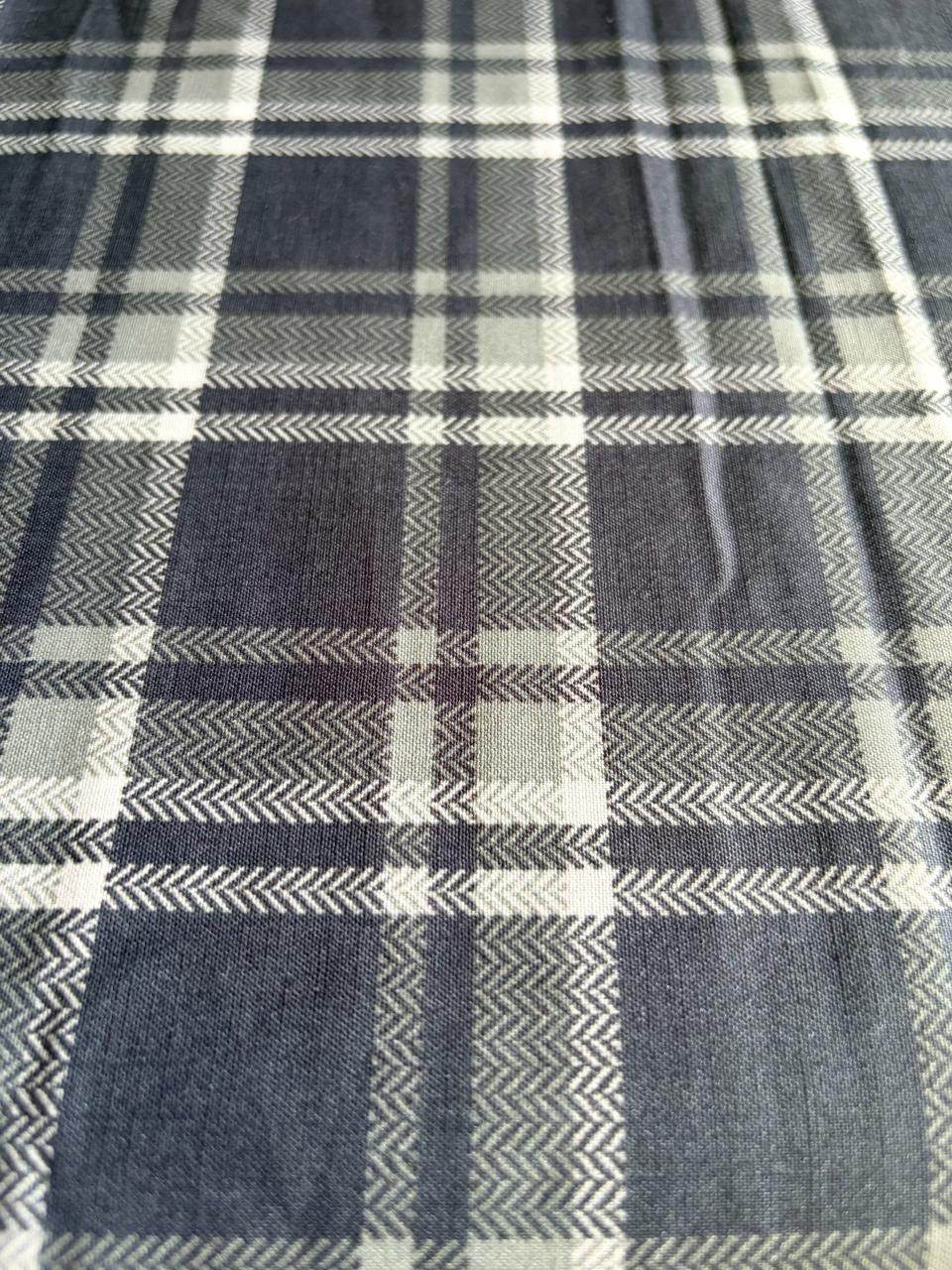 Multi-tonal plaid pattern in muted shades of Charcoal gray, Mid-tone grey, and crisp white cotton  Digital print Fabric