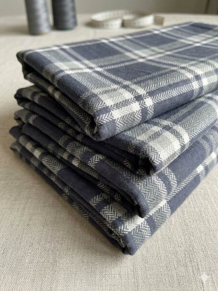 Multi-tonal plaid pattern in muted shades of Charcoal gray, Mid-tone grey, and crisp white cotton  Digital print Fabric
