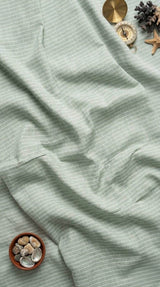 Soothing, muted sage green base accented by delicate, crisp white pinstripes Cotton linen fabric