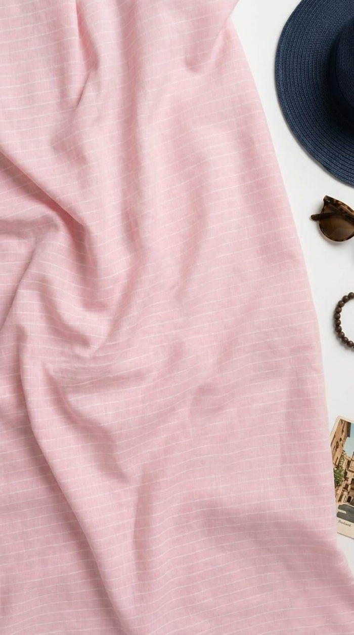 Gentle pastel pink hue complemented by fine white pinstripes Cotton Linen 60 Lea fabric