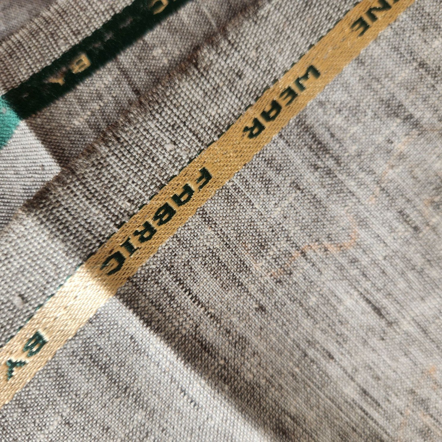 Sophisticated Grey melange with natural, earthy undertonesLinen-blend suiting Fabric
