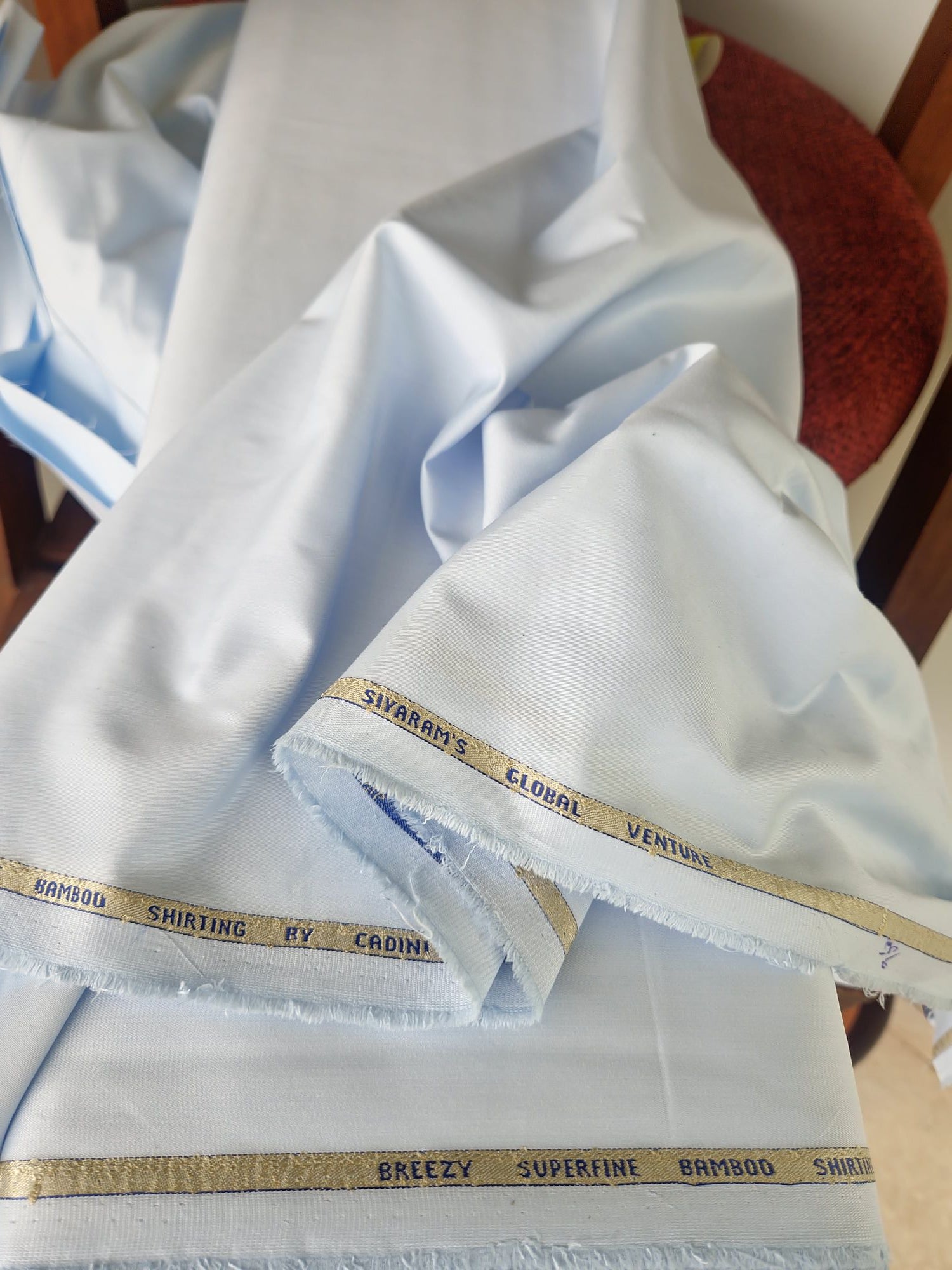 Siyaram’s Breezy Light Blue Superfine Sustainable Bamboo Shirting Fabric | Cadini Italy Collection