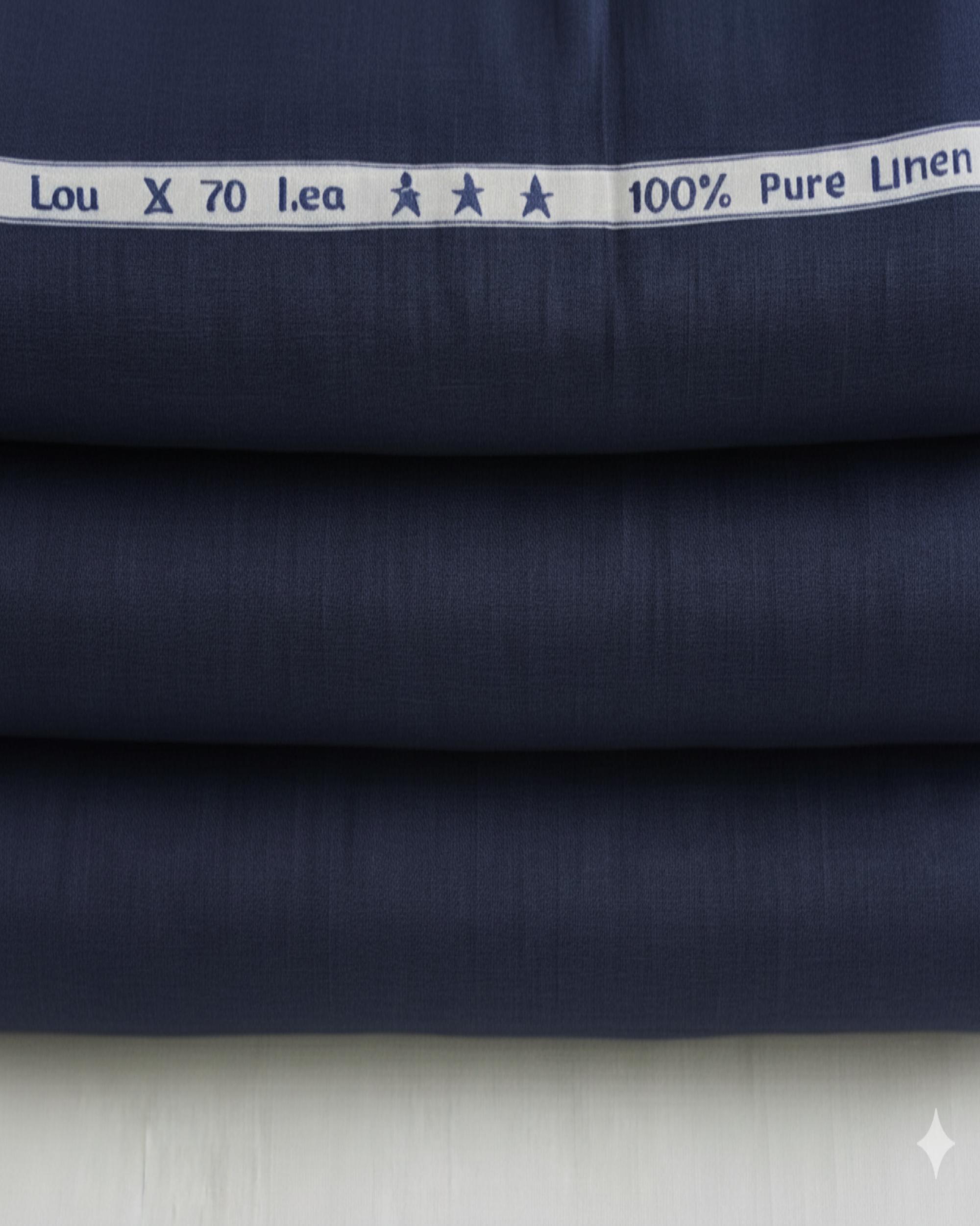 Navy fabric with white label reading '100% Pure Linen' on a light gray background