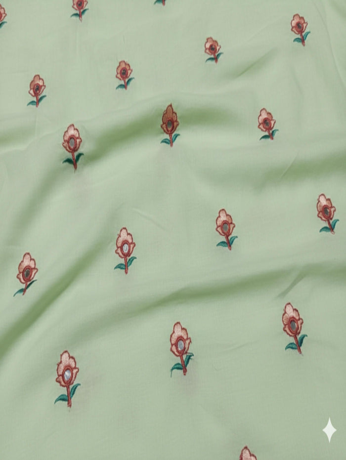 Pista Green Mul cotton Embroidered with threads and Faux Mirror Motifs