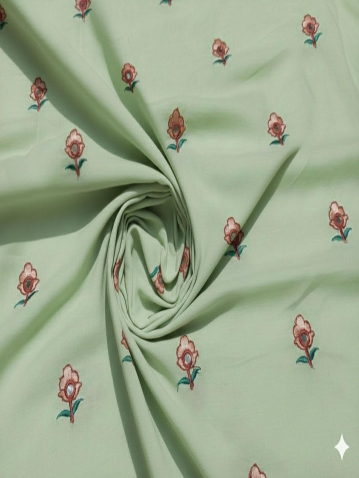 Pista Green Mul cotton Embroidered with threads and Faux Mirror Motifs
