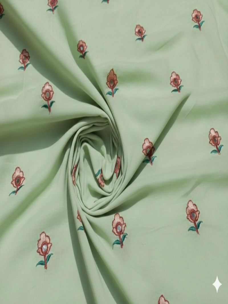 Pista Green Mul cotton Embroidered with threads and Faux Mirror Motifs