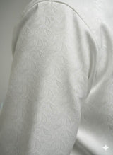 White Jaquard Style Paisley Textured Cotton Fabric