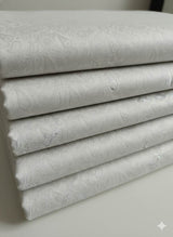 White Jaquard Style Paisley Textured Cotton Fabric