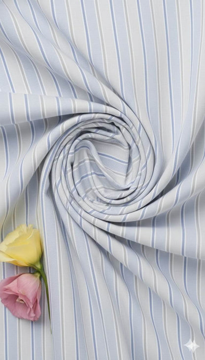 White shirting with light blue lines Fabric blend with cotton & polyster