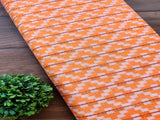 Light Orange Geometric Self Patterned Ikkat Cotton Fabric