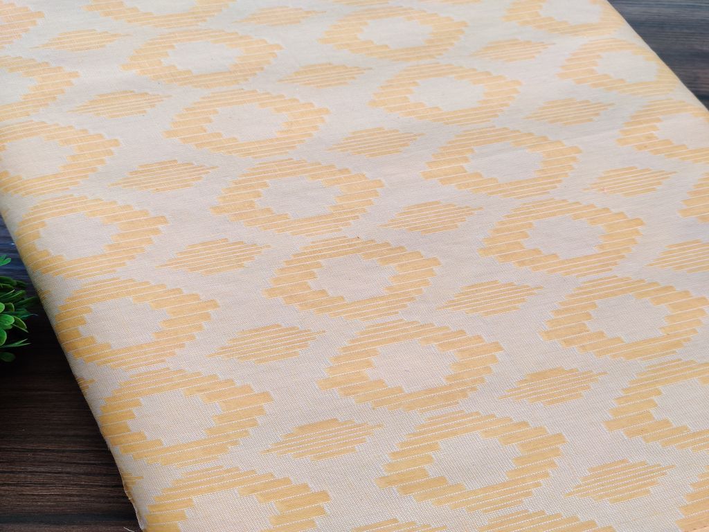 Yellow Self Geometric Brasso Cotton Fabric