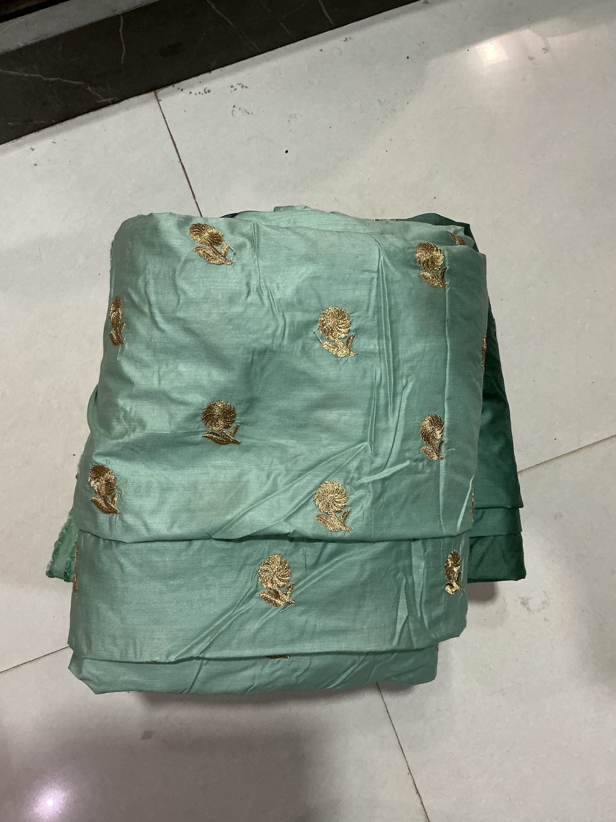 Sea-Green Malai Chanderi Fabric with Light Golden Jari Embroidery - folded fabric detail