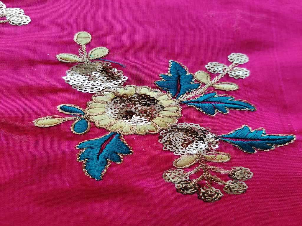 Bright Pink Sequins and Thread Embroidered Flowers Embroidered Chanderi Fabric