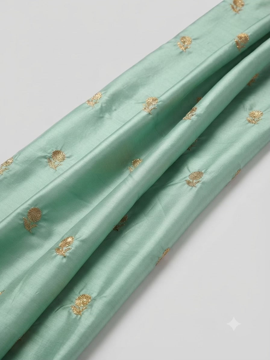 Sea-Green Malai Chanderi Fabric with Light Golden Jari Embroidery - close-up of weave and texture