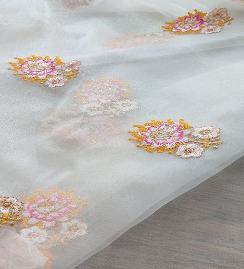 Multicoloured floral thread and zari embroidered white organza fabric