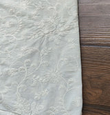 Off White Floral Dyeable Cotton Fabric