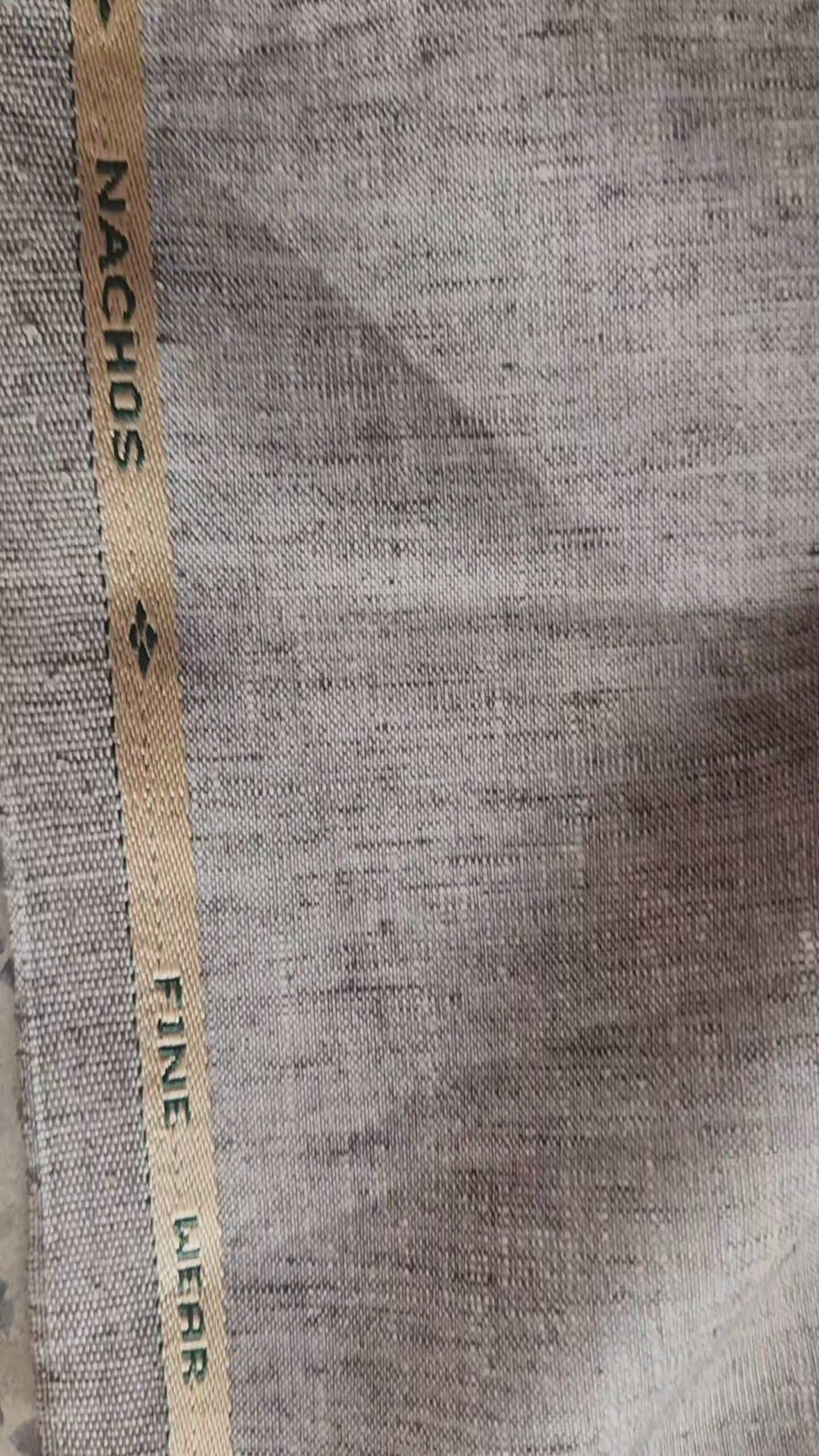 Sophisticated Grey melange with natural, earthy undertonesLinen-blend suiting Fabric