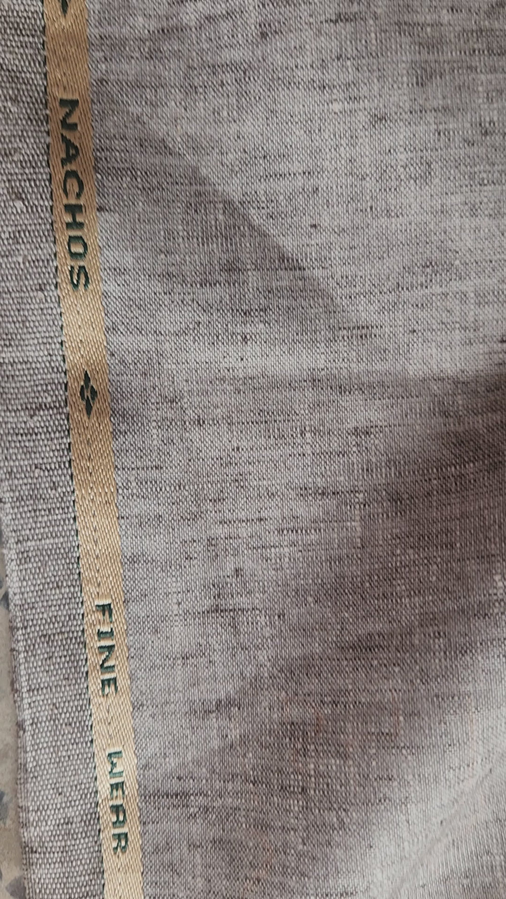 Sophisticated Grey melange with natural, earthy undertonesLinen-blend suiting Fabric